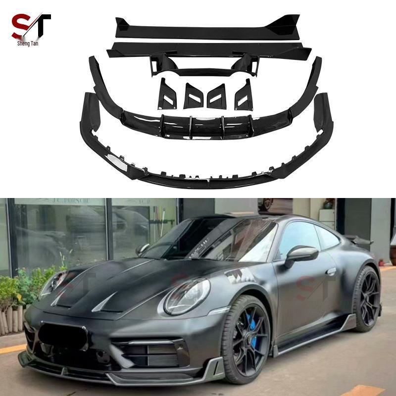 

Карбоновий обвіс у стилі Шопена для Porsche 911 992: Передній та задній сплітери, бічні спідниці, центральний сплітер, дефлектори вікон