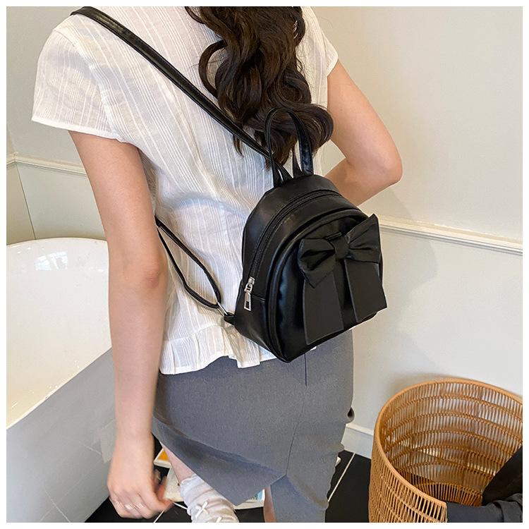 Sac à dos en cuir synthétique style coréen avec nœud papillon pour femme Sac à bandoulière matelassé léger