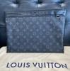 [Pre-Owned] Discovery Logo Pattern Printed Metal Accessories Coated Canvas Clutch Large - Very Good #1FTNBWX