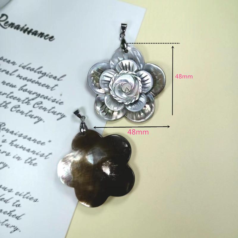 Handcrafted Black Shell Flower Pendant With Design For Vintage Jewelry Enthusiasts