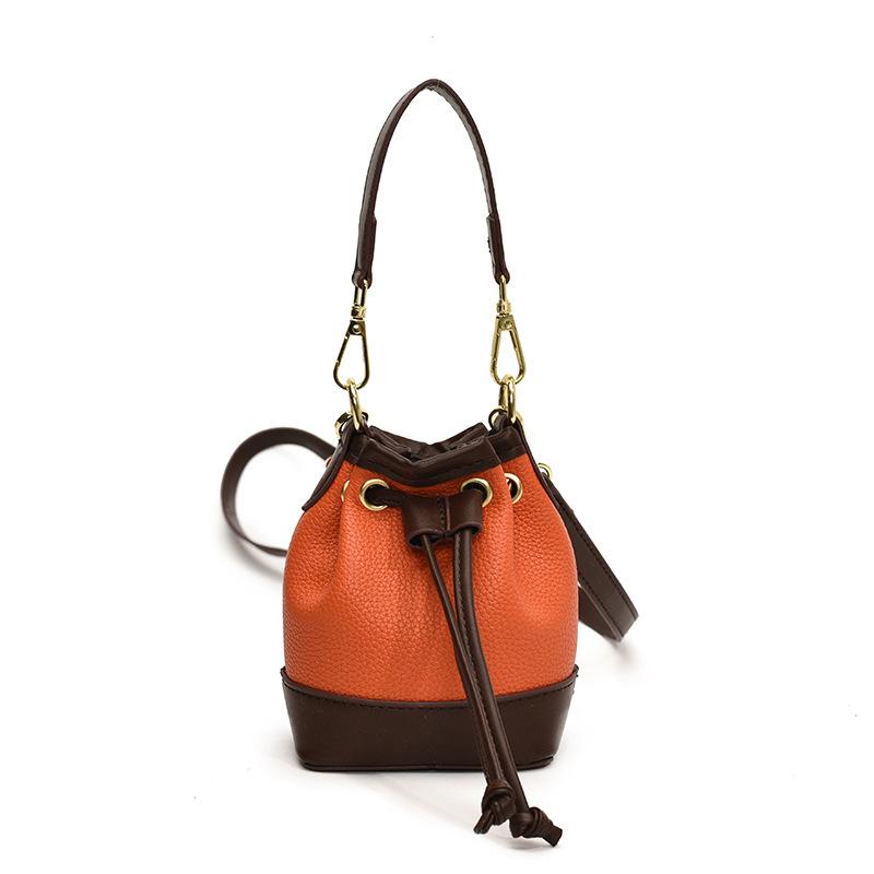 Este ano, a bolsa popular feminina 2025 nova versão coreana da moda bolsa de ombro com estampa de leopardo bolsa mensageiro portátil mini bolsa balde