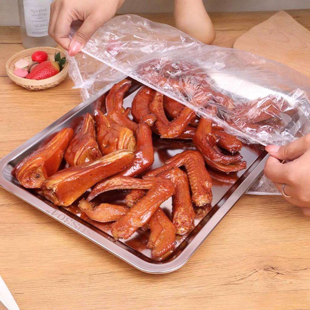 of Food-Grade Cling Film - Multifunctional Disposable Wrap,-Proof And Stretchable Cover, Suitable for Leftover Food, , Picnics, And Travel.