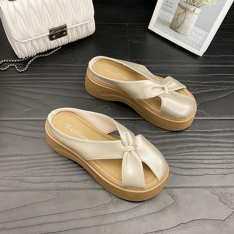 

Сланцы на толстой подошве, популярные в интернете, женские летние для улицы, 2025, новый зарубежный стиль, высокая ценность, универсальные, на толстой подошве, увеличивающие рост, ленивые крутые шлепанцы 40 шампанского