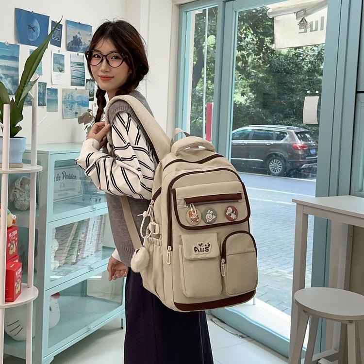 Schoolbag new junior high school student high school student schoolbag large capacity primary school student burden reduction ridge protection high