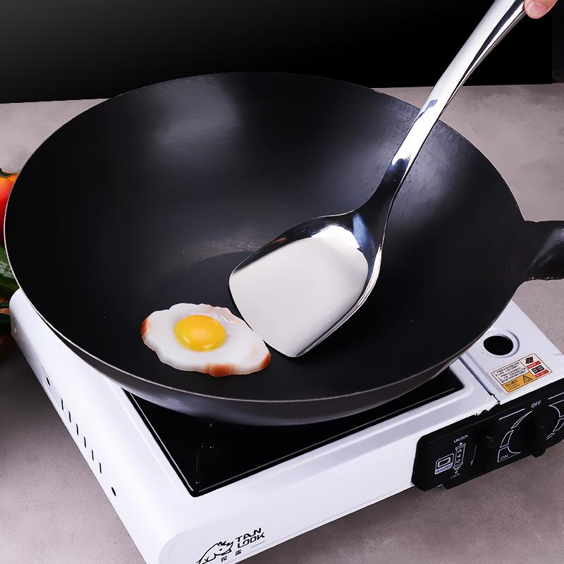 Household old-fashioned iron pan, black steel wok, single-handled non-stick pan, chef's stir-fry pan with round bottom.