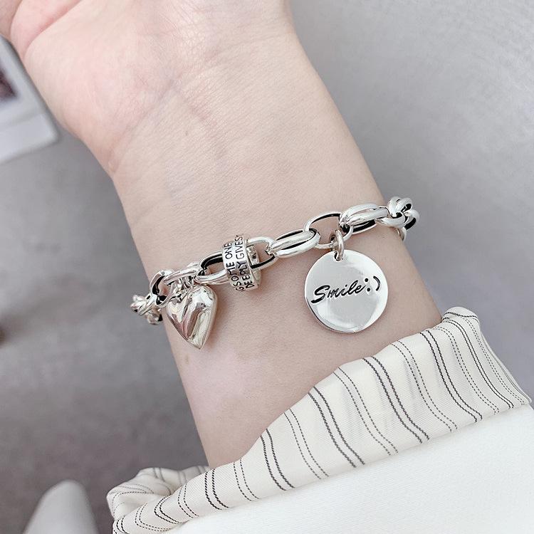 Japanese-Korean Niche Love Heart Bracelet for Women: S925 Silver-Plated Simple Letter Round Tag Bangle, Trendy Student Jewelry.