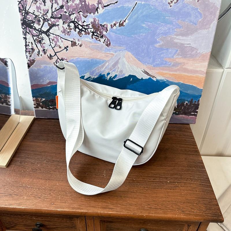 Stylish Street Trend Dumpling Shape Crossbody Bag For Women Featuring Soft Oxford Fabric And Interior Phone Pocket белый