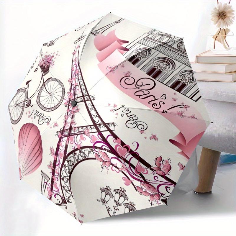A Stylish Folding Umbrella Featuring a Vintage Floral Design of The Eiffel Tower in Pink, Perfect for And Travel, Making It an Ideal Decorat