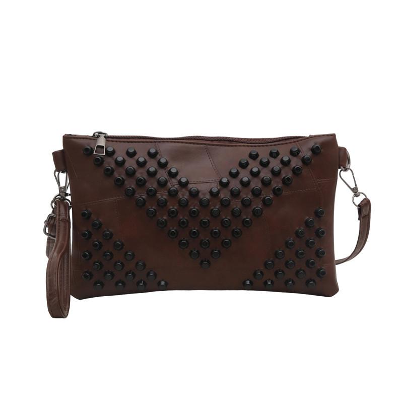 

Bag women s 2025 new trendy and popular personalized rivet shoulder bag foreign style casual retro European and American fashion messenger bag темно-коричневого
