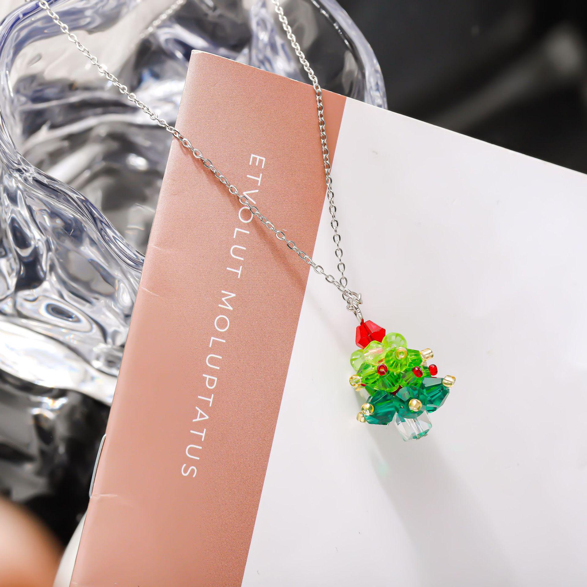 

2024 Элегантный двухцветный набор ожерелья и серег в виде рождественской елки