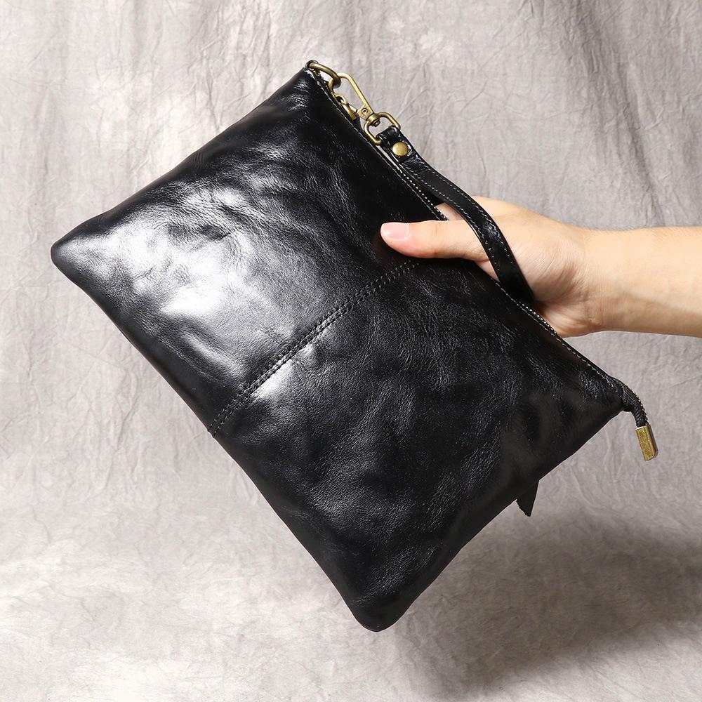 

Vintage Leather Unisex Clutch: Stylish, Pleated Large Capacity Wrist Bag for Documents