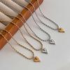 Blogger Chic Gold & Silver Color-Block Heart Necklace: Elegant Titanium Steel Beaded Design for Women
