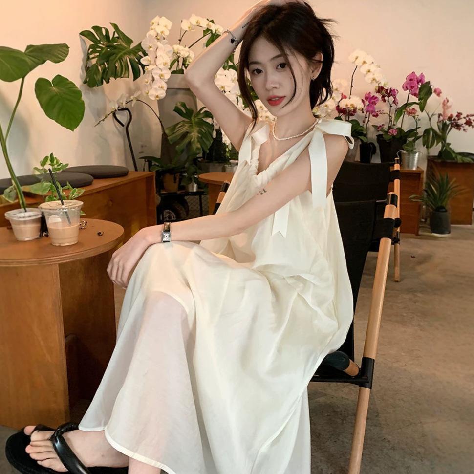 Fashion beige gentle wind lace-up suspender dress women's summer lined sweet loose backless A-shaped long dress
