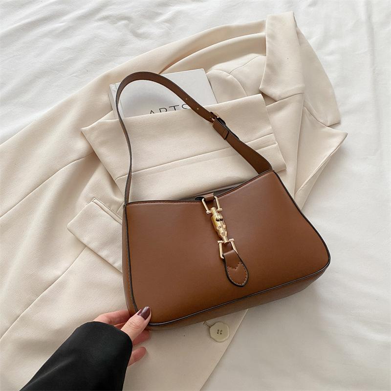 

2025 новая иностранная универсальная маленькая сумка женская сумка высокого класса сумка через плечо осенне-зимняя фактурная сумка-багет сумка подмышкой коричневый
