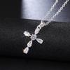 Women Teardrop Stone Cross Pendant Necklace with Central Round Stone Elegant Sparkling Religious Inspired Jewelry for Daily and Special Occasions