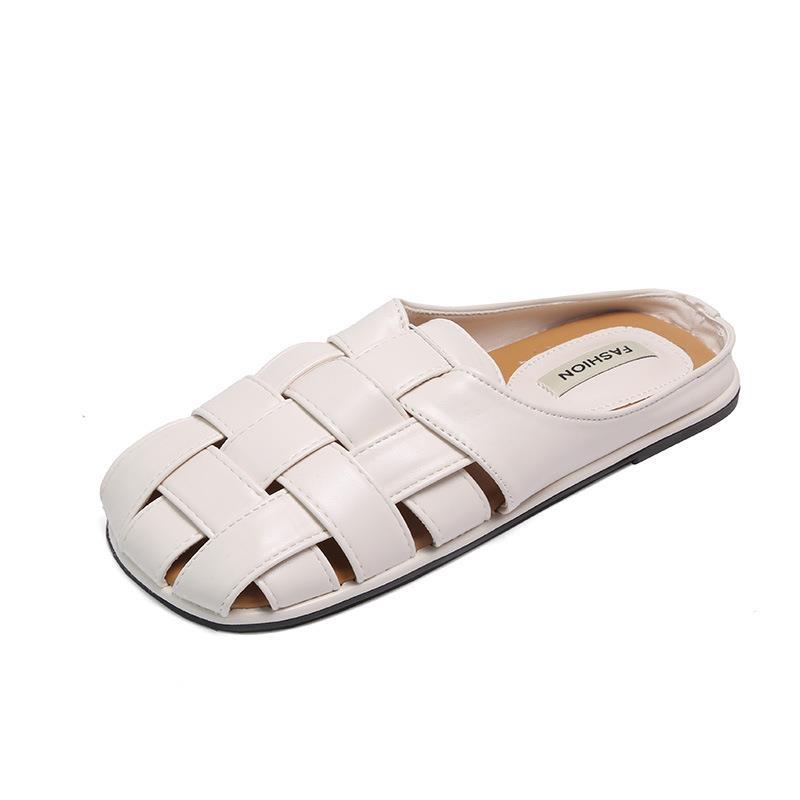 Baotou half slippers woman 2025 new lazy woman wearing flat bottom one pedal beach shoes woman