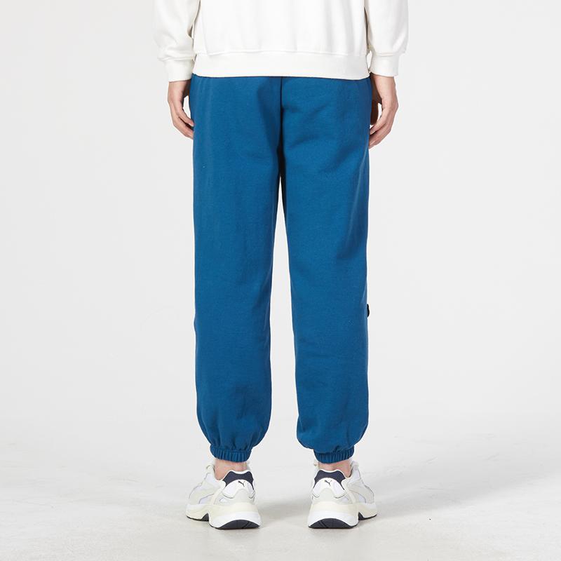 Puma Team Badge Sweatpants With Solid Color Logo Cuff Men Bottoms Blue 677378-45