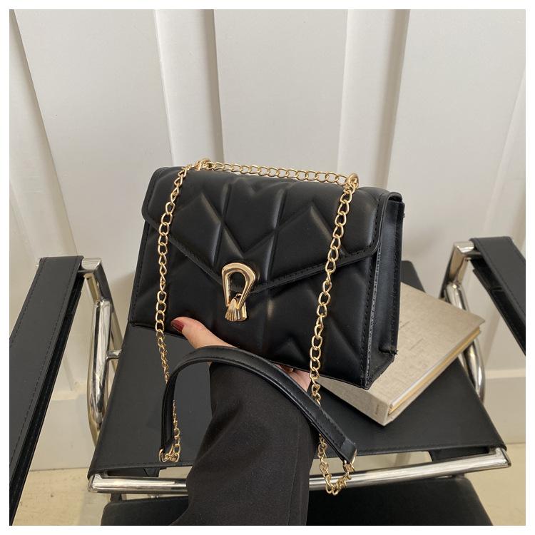 

Foreign style chain bag women s 2024 new summer fashion shoulder crossbody small square bag solid color plaid embroidery thread women s bag чорний