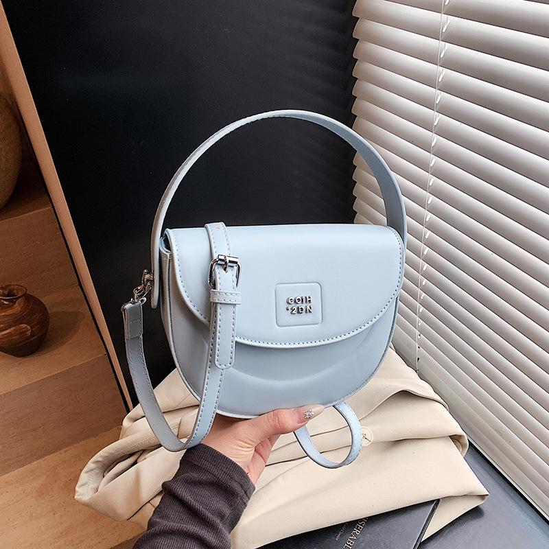 

Summer niche texture handbag small bag women s 2025 new simple saddle bag versatile shoulder messenger bag синій