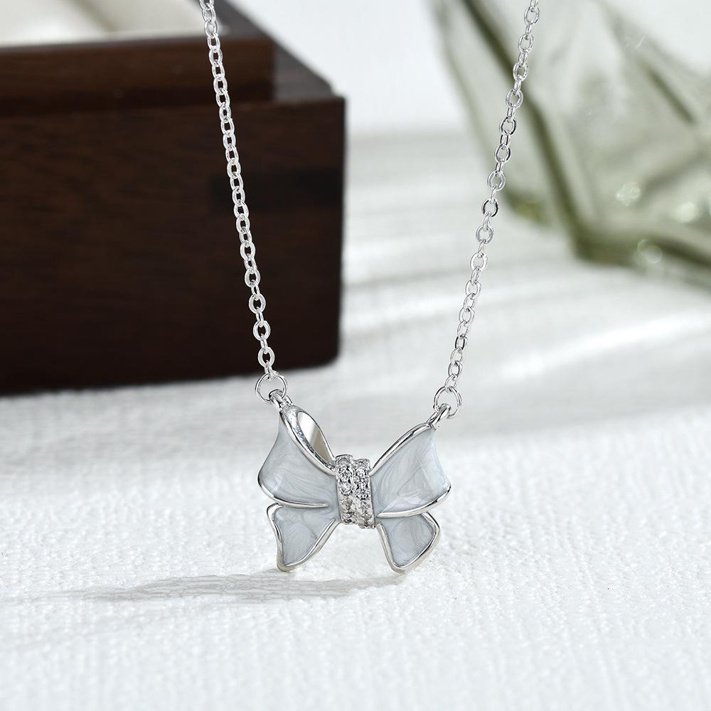 Japanese and Korean Ins Simple Bow Inlaid with Zircon Three-piece Set Ring Stud Earrings Pendant Necklace
