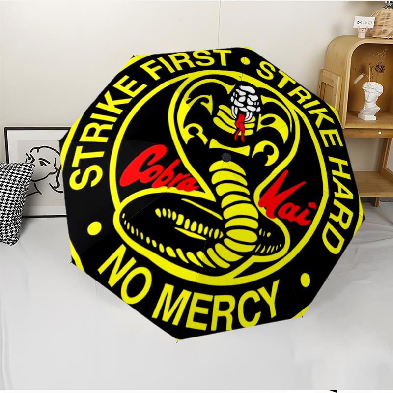 Cobra Kai Fashionable Automatic Opening/Closing Folding Umbrella. Portable and Foldable, Ideal for Gift, Travel, and Daily Use.