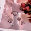 Kirschblütenrosa Zirkonia Schmuckset: Damen Luxus Ring, Ohrringe und Halskette mit Blütenblatt-Design