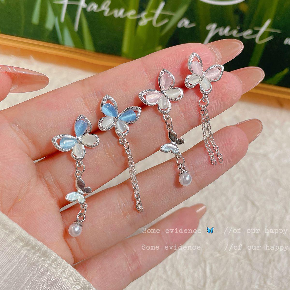 

Summer Butterfly Cat s Eye Tassel Earrings: Asymmetrical Pink & Blue Design with Silver Needle for Women