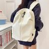 A Trendy and Lightweight Travel Backpack for Middle School Students In A Leisure Campus