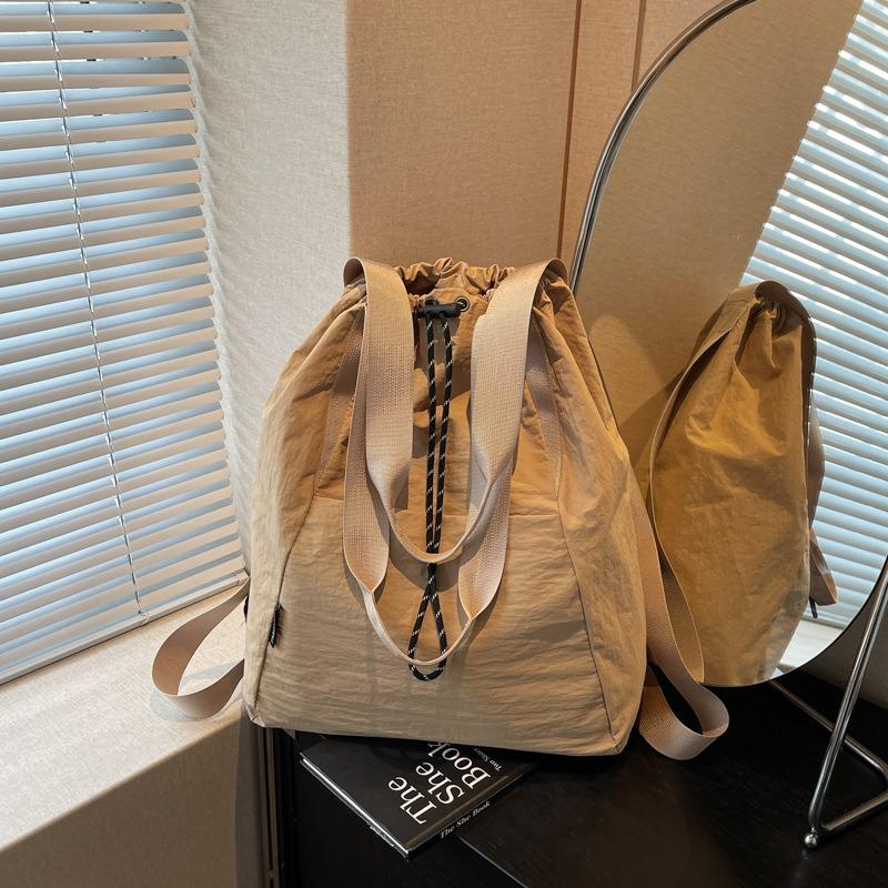 Casual lightweight drawstring multi-purpose backpack new large-capacity sports shoulder slack bucket bag
