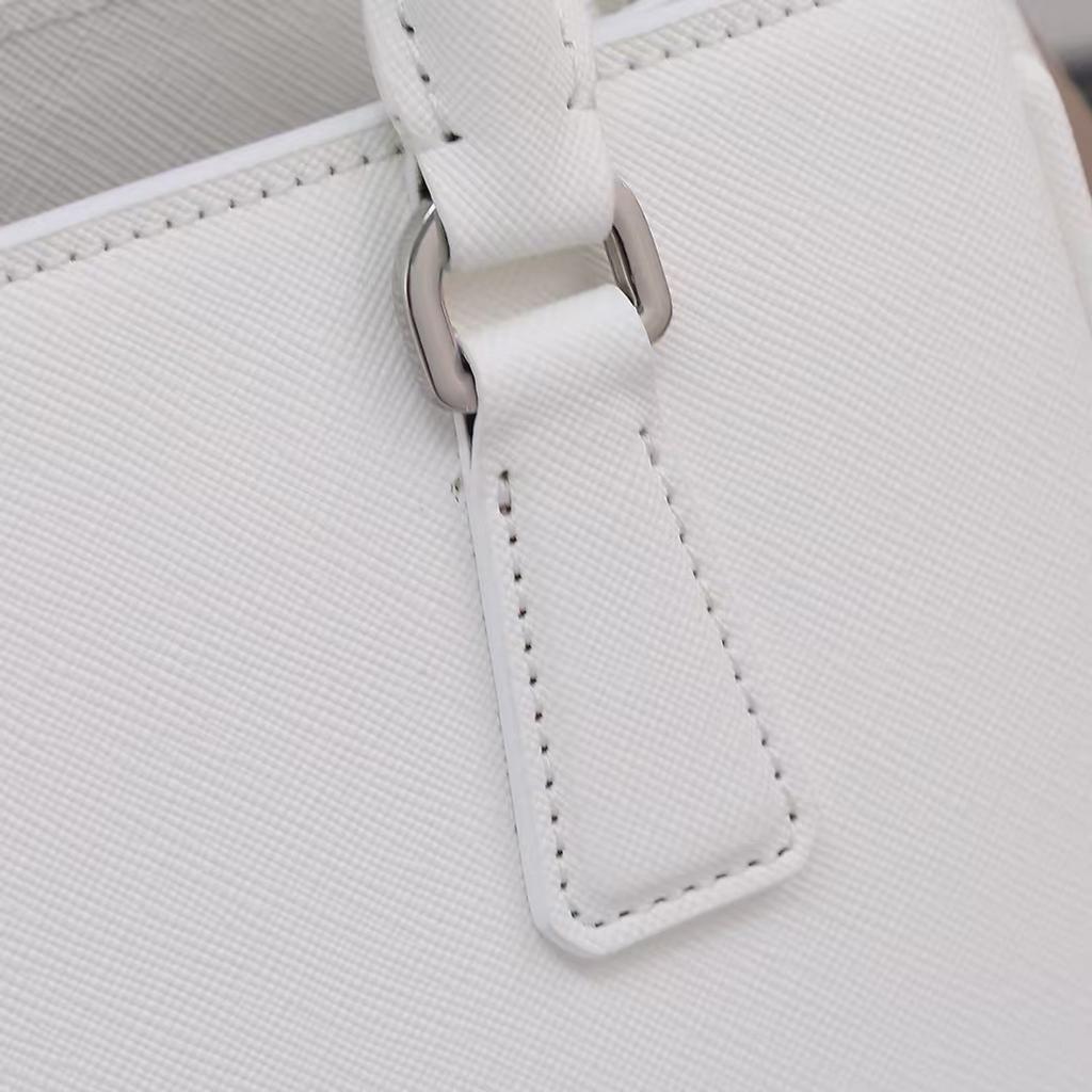 Leder-Damenhandtasche, tragbare Schulter-Umhängetasche, Killer-Tasche, Rindsleder-Tasche, Bacchus-Tasche, Beuteltasche, Faltentasche, Smiley-Tasche.