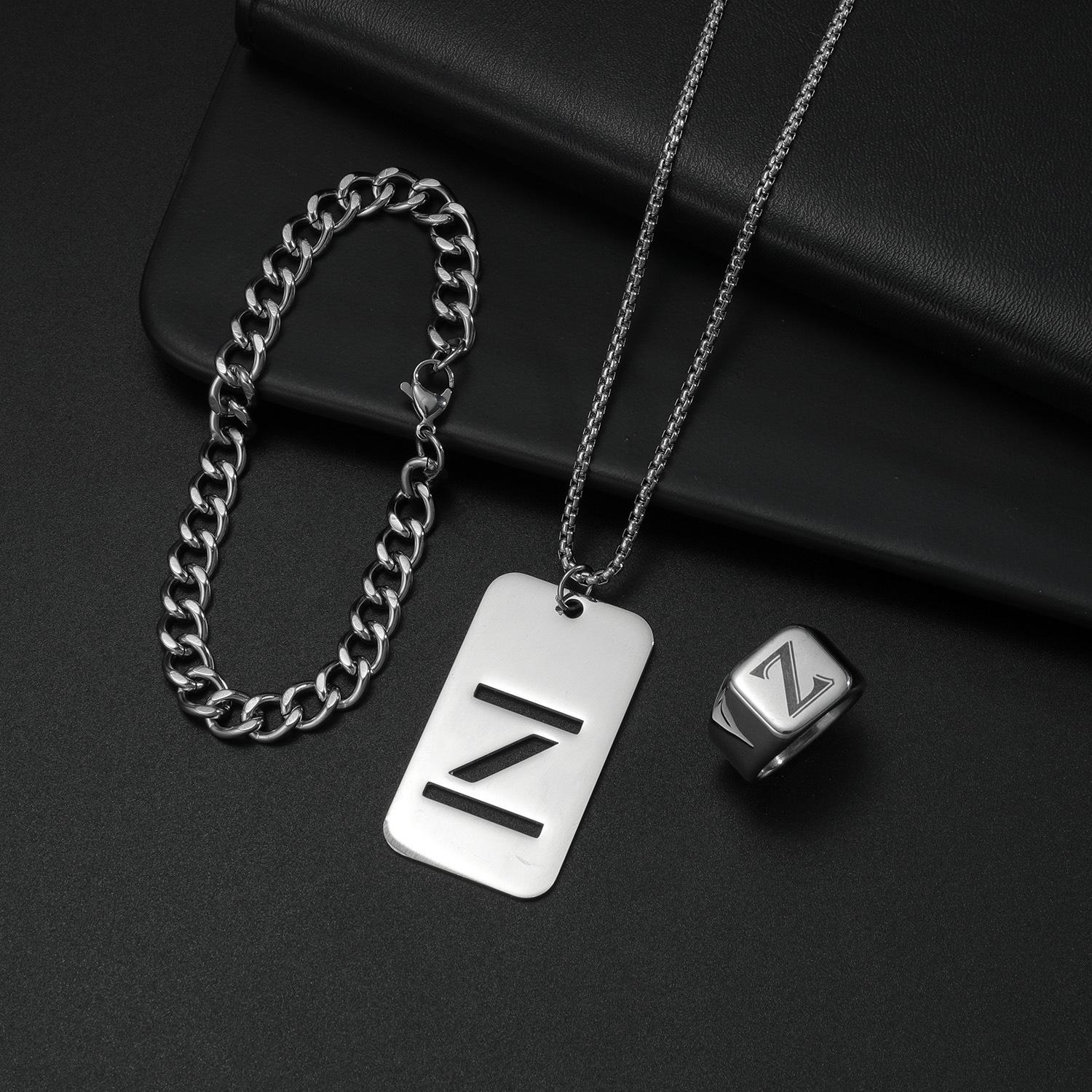 

Раздел моды Титановый стальной набор украшений 26 букв алфавита Комплект украшений Темперамент Пара для мужчин и женщин Украшения для вечеринок Подарки на день рождения