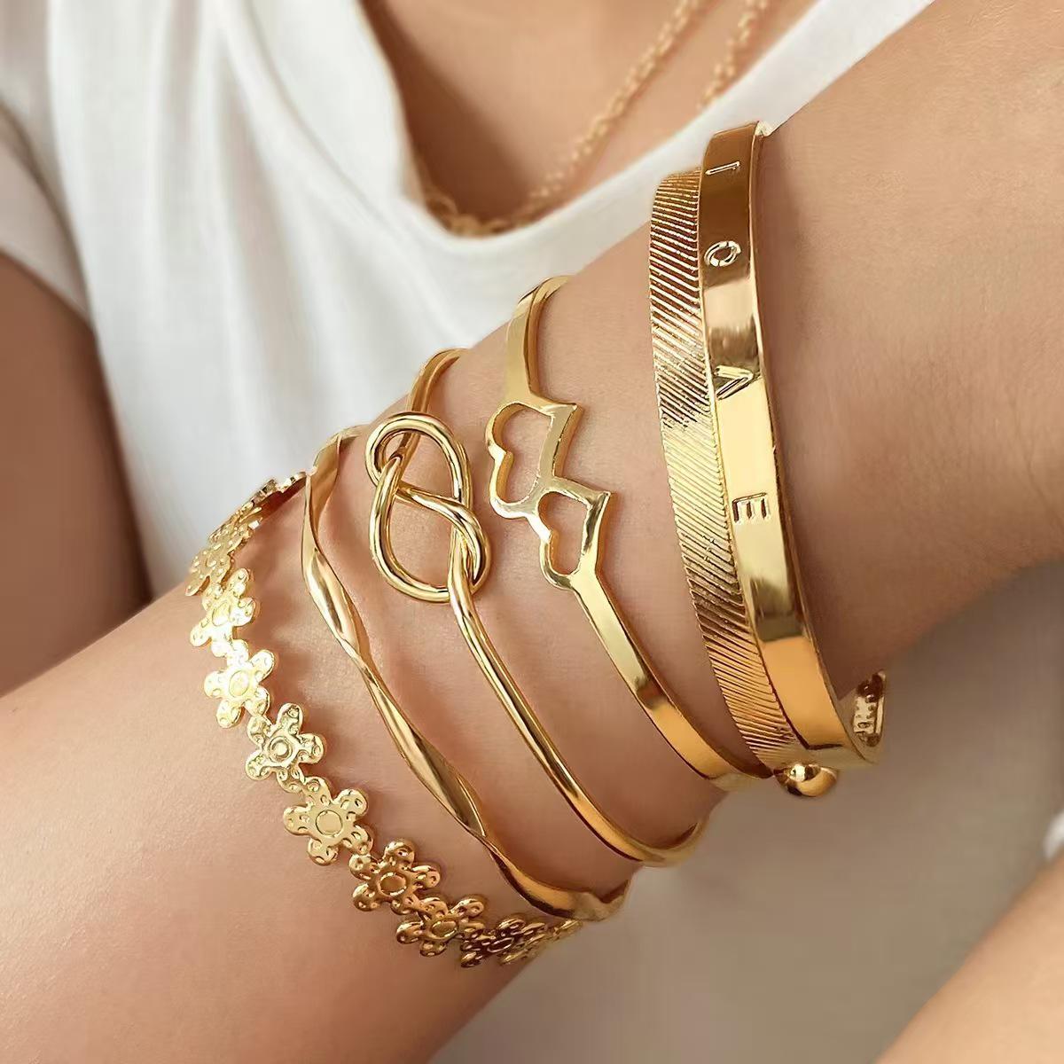 Trendy Knotted Heart Bracelet Set: Four Versatile Openable Bracelets for Women