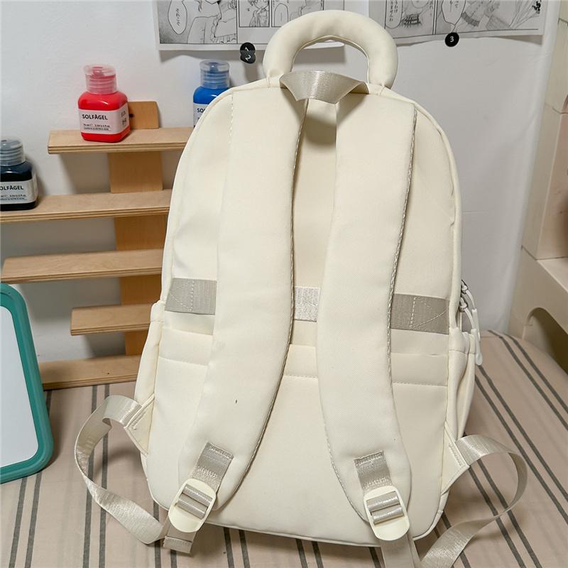 Cute Light Blue Backpack with Padded Top Handle Front Zipper Pocket Adjustable Straps Casual School Bag