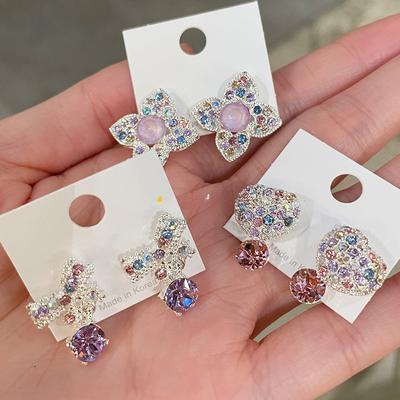 Diamantbezette liefdesstrik oorbellen, exquise lichte luxe temperament oorbellen, veelzijdige niche high-end oorbellen