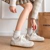 Nischen-Retro-Rundkopf-Low-Top-Deutsche Trainingsschuhe Neue Frühjahrs-Freizeit-Atmungsaktive Sport-Flachsohlen-Schuhe