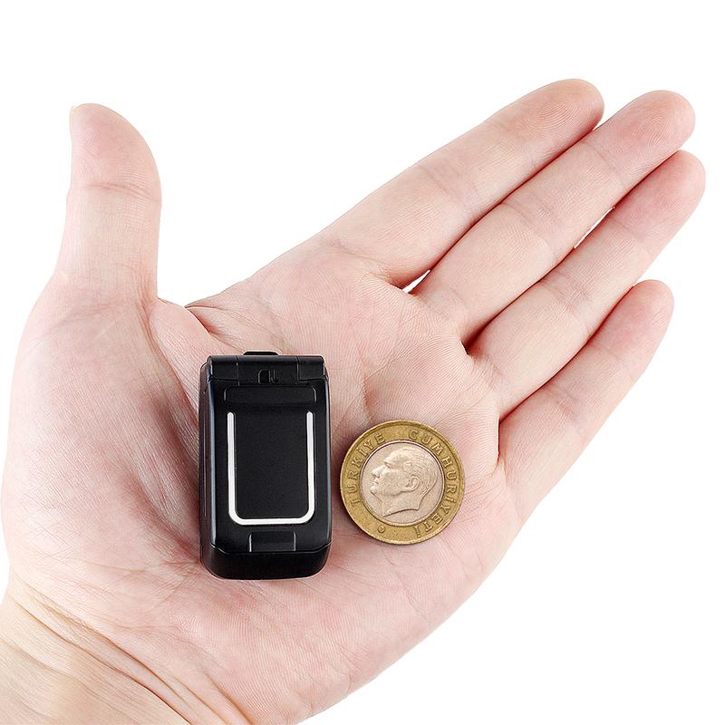 0,66" Mini Flip Mobiltelefon Minste klapptelefon FM Trådløs Bluetooth 3.0 Oppringer Handsfree Øretelefon Enkelt SIM-kort telefon