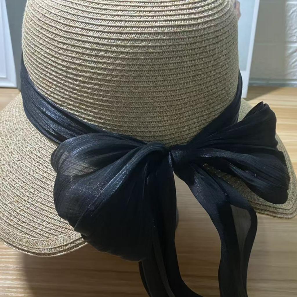New beach hat women's vacation sunscreen straw hat summer shading big eaves foldable seaside bow straw hat