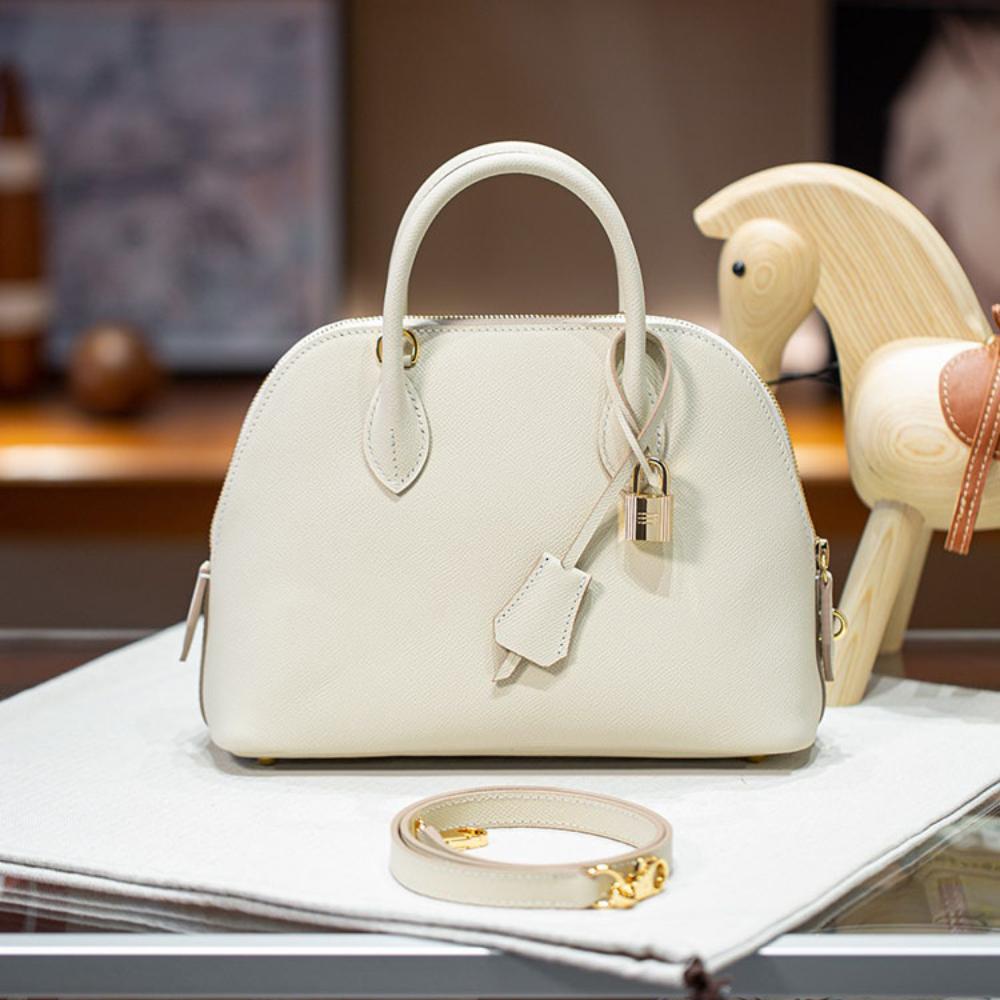 

Импортная коровья кожа первого слоя с тиснением под ладонь, сумка-кегли, 25 см, натуральная кожа, женская сумка, портативная, на плечо, кроссбоди 25 * 18 * 9cm (no gift box)