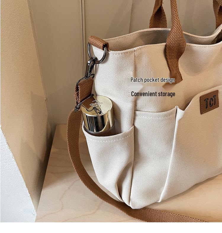 2026 Women's Large Capacity Canvas Tote: Versatile, Fashionable Handheld Shoulder Bag for Commuting