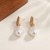 Meier Pearl earrings: minimalist, commute-ready style. elegant earrings for women, perfect for year-round wear