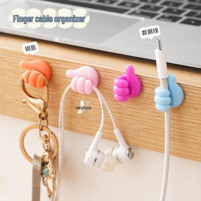 Crochet de pouce Multifonctionnel Support de Câble de Données et Chargeur pour Téléphone Mobile.