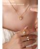 Hong Kong-Style Elegant Heart-Shaped Cat's Eye Stone Pendant Necklace On Gold-Plated Clavicle Chain.
