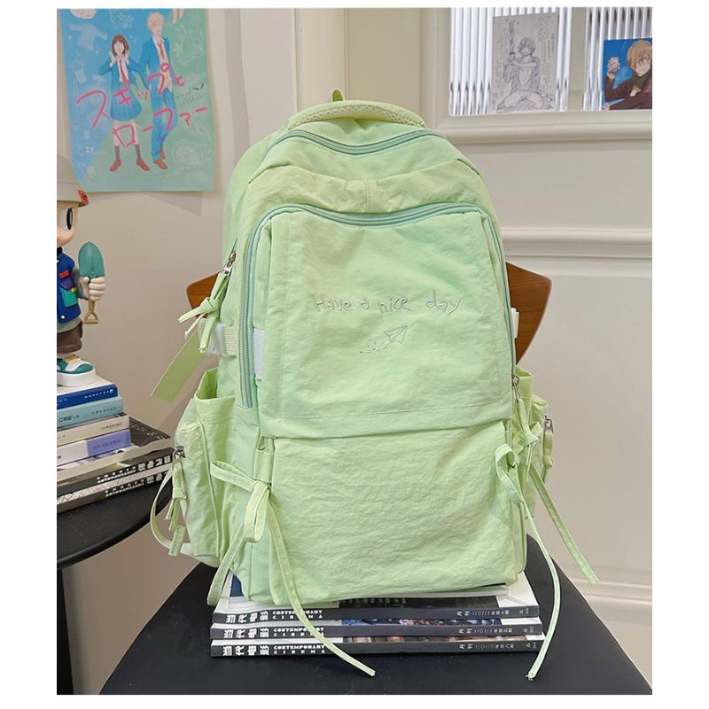 

Japanese style light solid color backpack outdoor travel large capacity backpack casual versatile college student commuting schoolbag