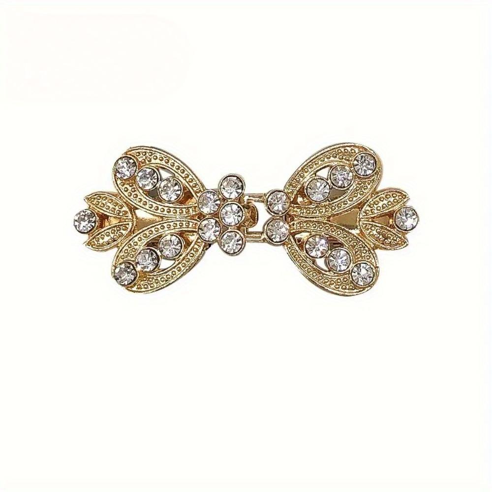 

Rhinestone Sweater Clip. Alloy cape & collar clasp for scarves, waist & clothing. Enhances any outfit.