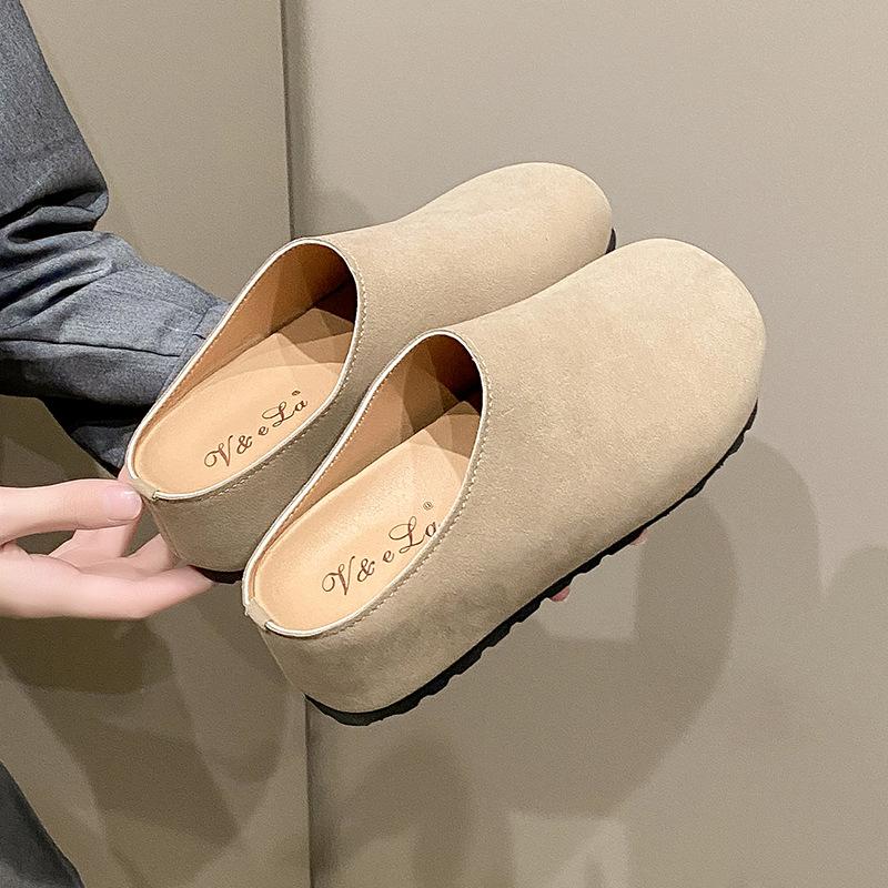 2025 autumn and winter new flat-bottomed lazy one-pedal half slippers matte leather retro bag head slippers women