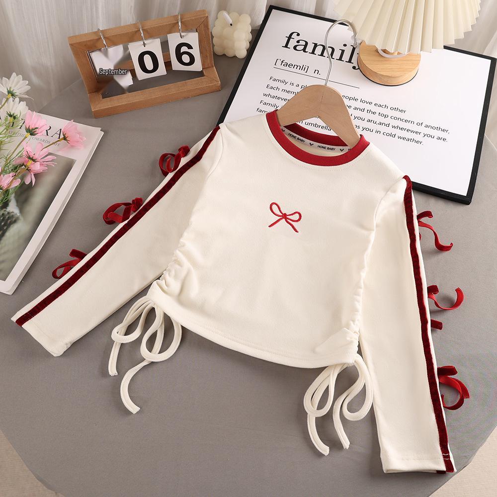 

Дівчача футболка з вишивкою-бантом з довгим рукавом для весни та осені 140cm