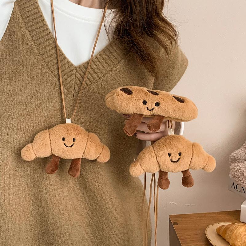 

Plush croissant smiley face leather necklace cute bread sweater chain fashion personality design sense necklace women