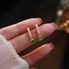 pair of needle earrings
