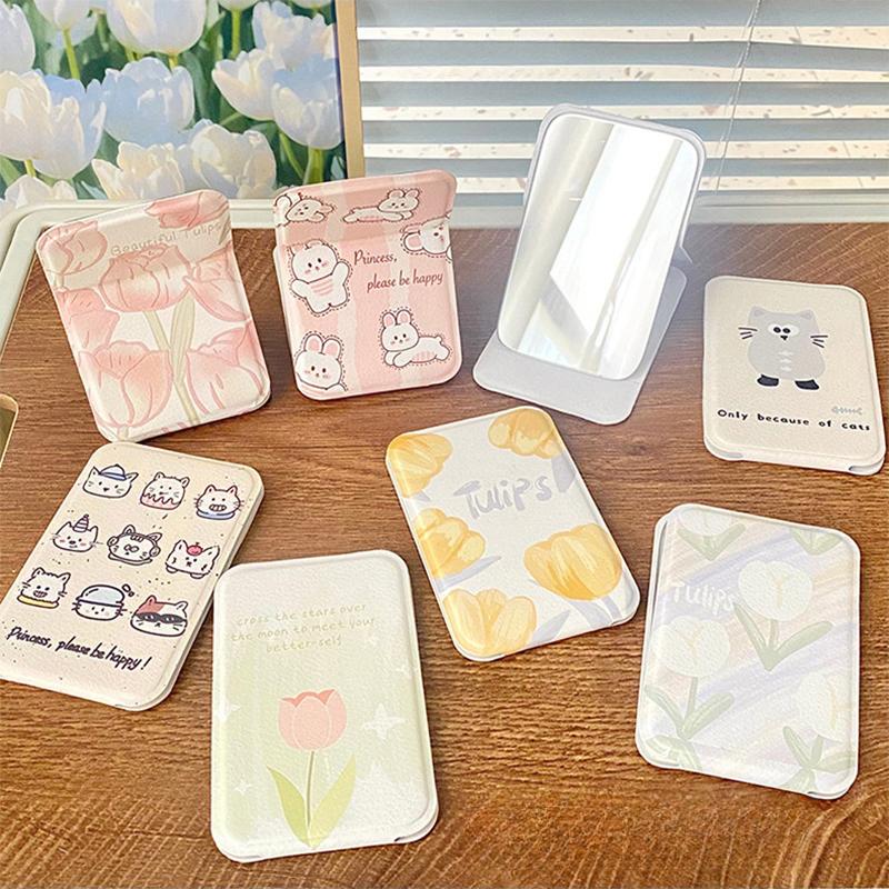 Stolní kosmetické zrcátko Jednobarevné PU kůže Jednoduché Přenosné Ruční kosmetické zrcátko Skládací Studentské Kompaktní Roztomilé Kapesní zrcátko