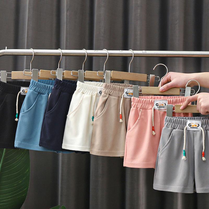 Nya sommarpojkar shorts godisfärg badshorts för barn avslappnade elastisk midja barn korta byxor sportkläder ytterkläder